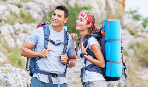 Couple hiking on a rocky mountain